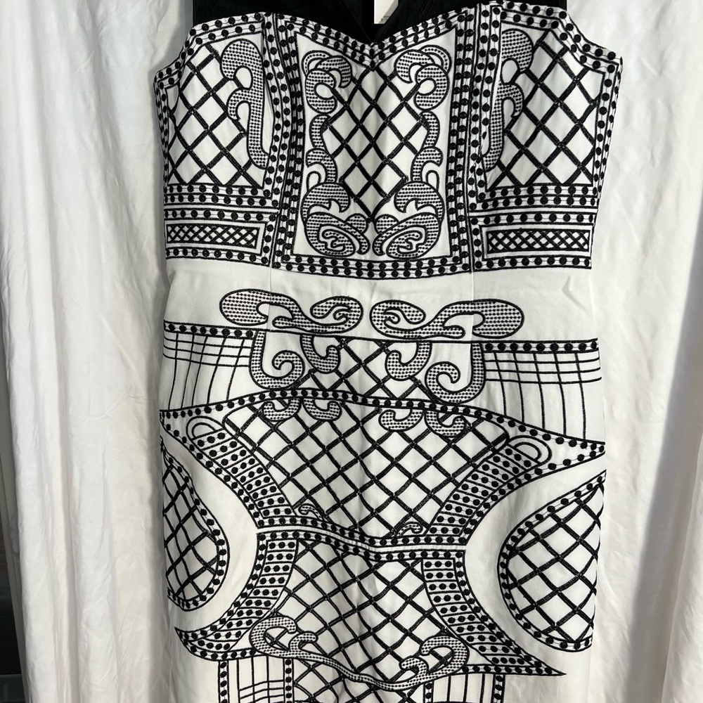 Black on white embroidered dress by Antonio Melani